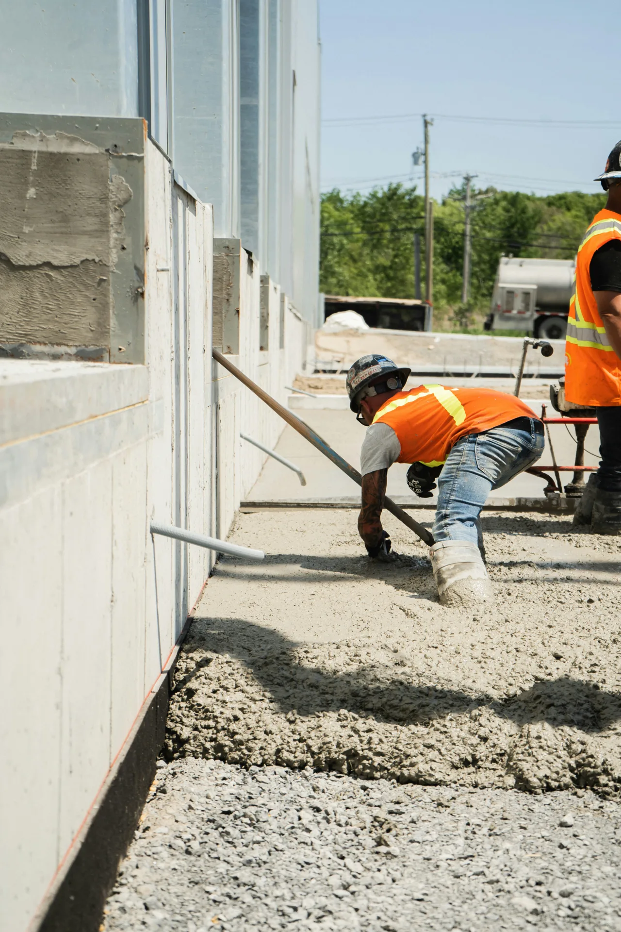 commercial concrete sidewalk pour being finished in Abbotsford