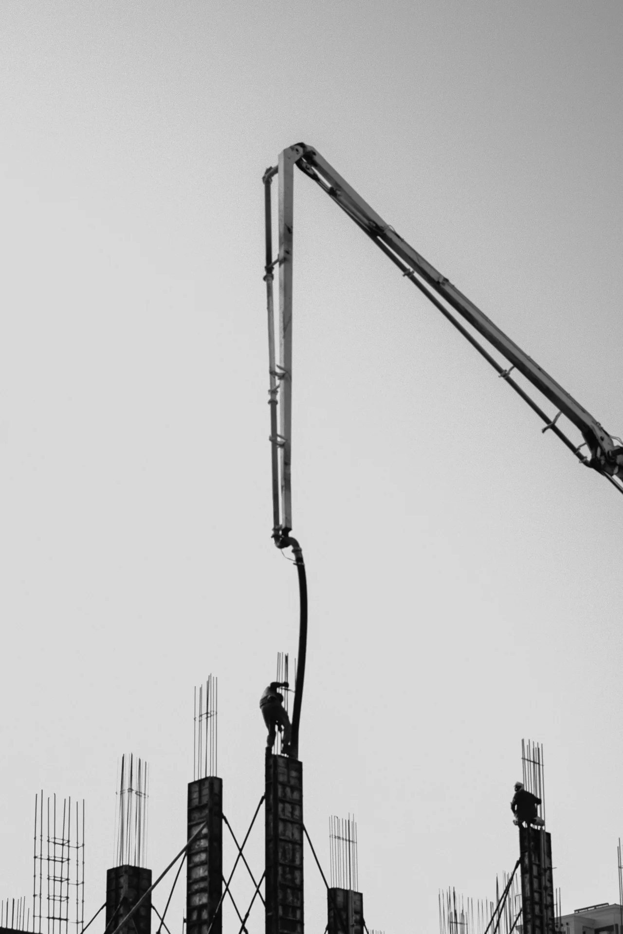 concrete pump and rebar on a tilt-up construction site in Abbotsford