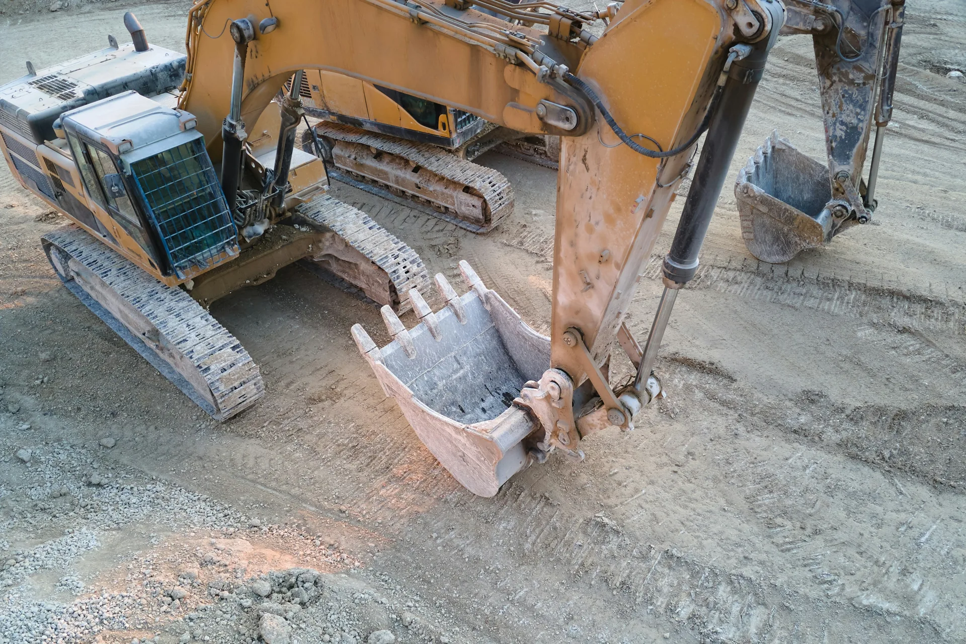 excavator working on a heavy-equipment concrete pad in Abbotsford