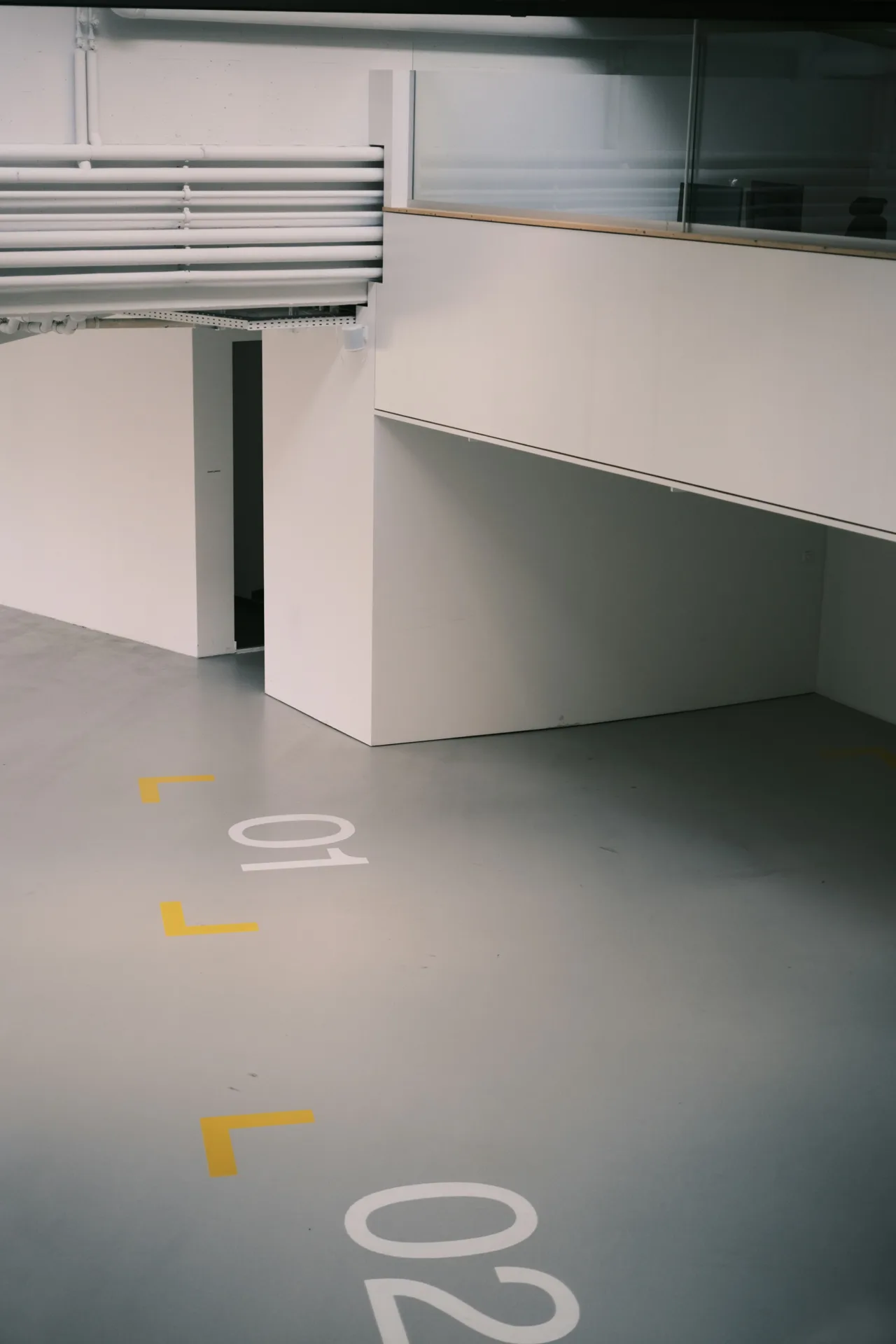coated warehouse floor with line marking in a Abbotsford facility