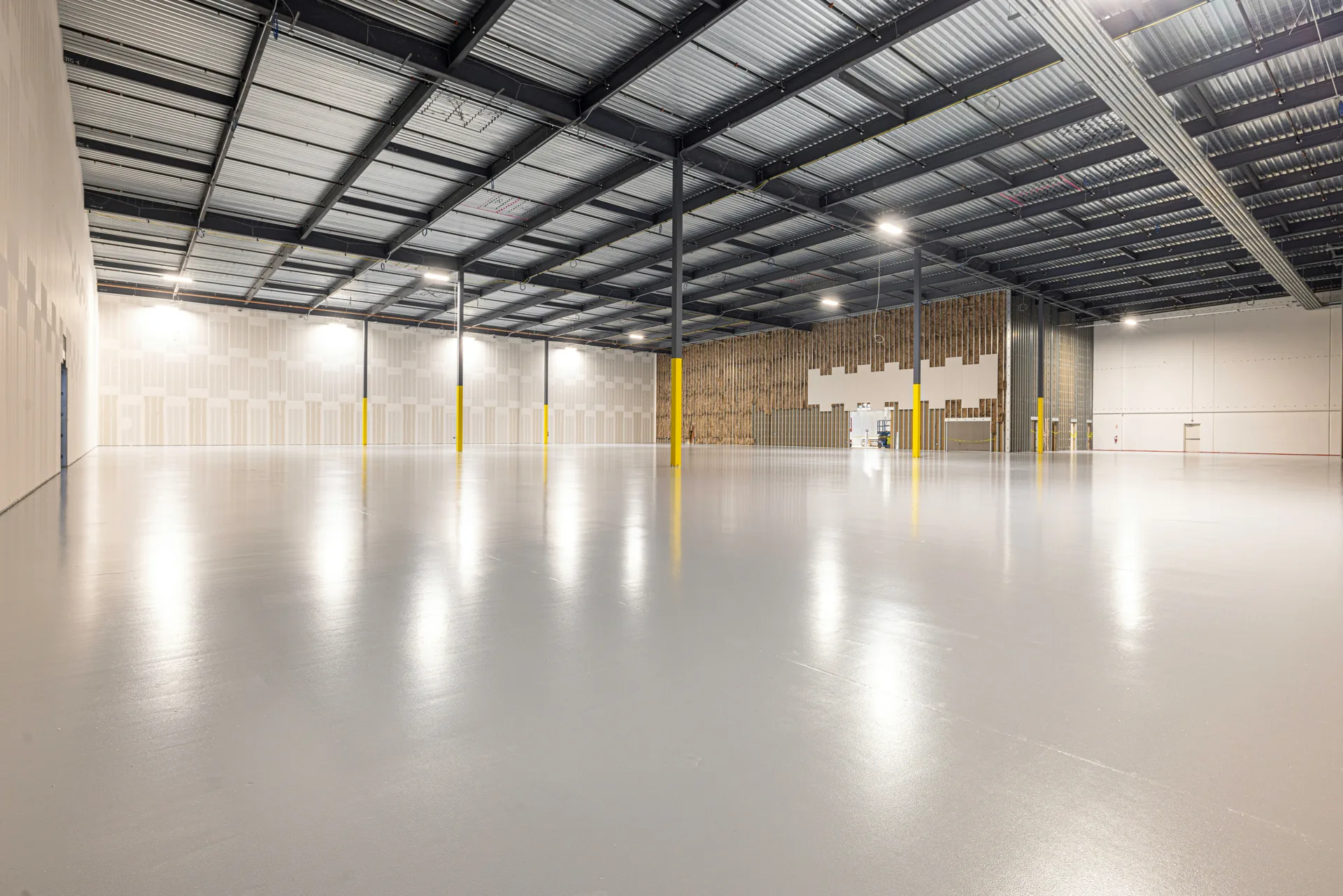 finished grey epoxy warehouse floor in a Abbotsford distribution centre