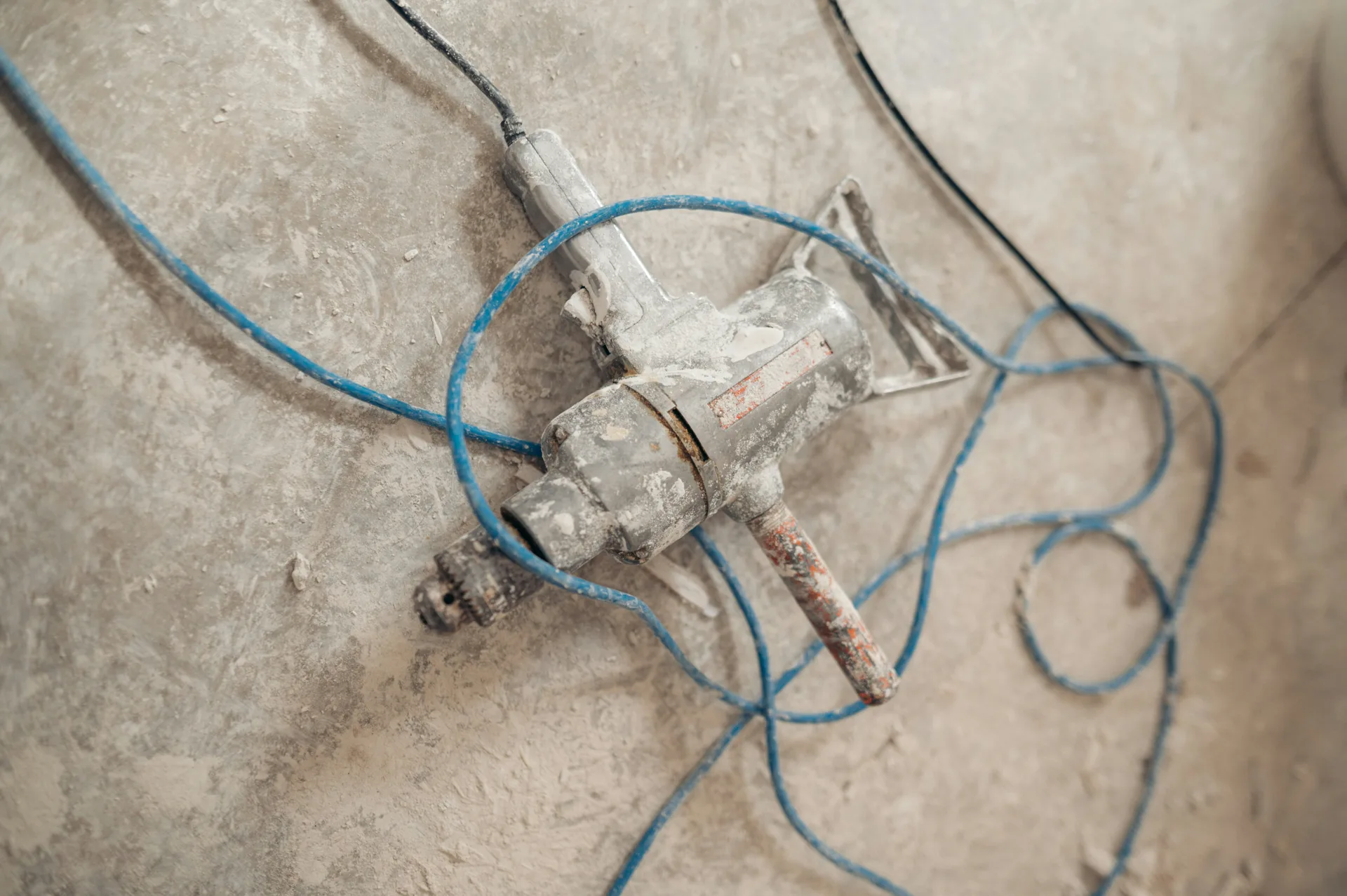 jackhammer removing a failed section of concrete for repair in Abbotsford