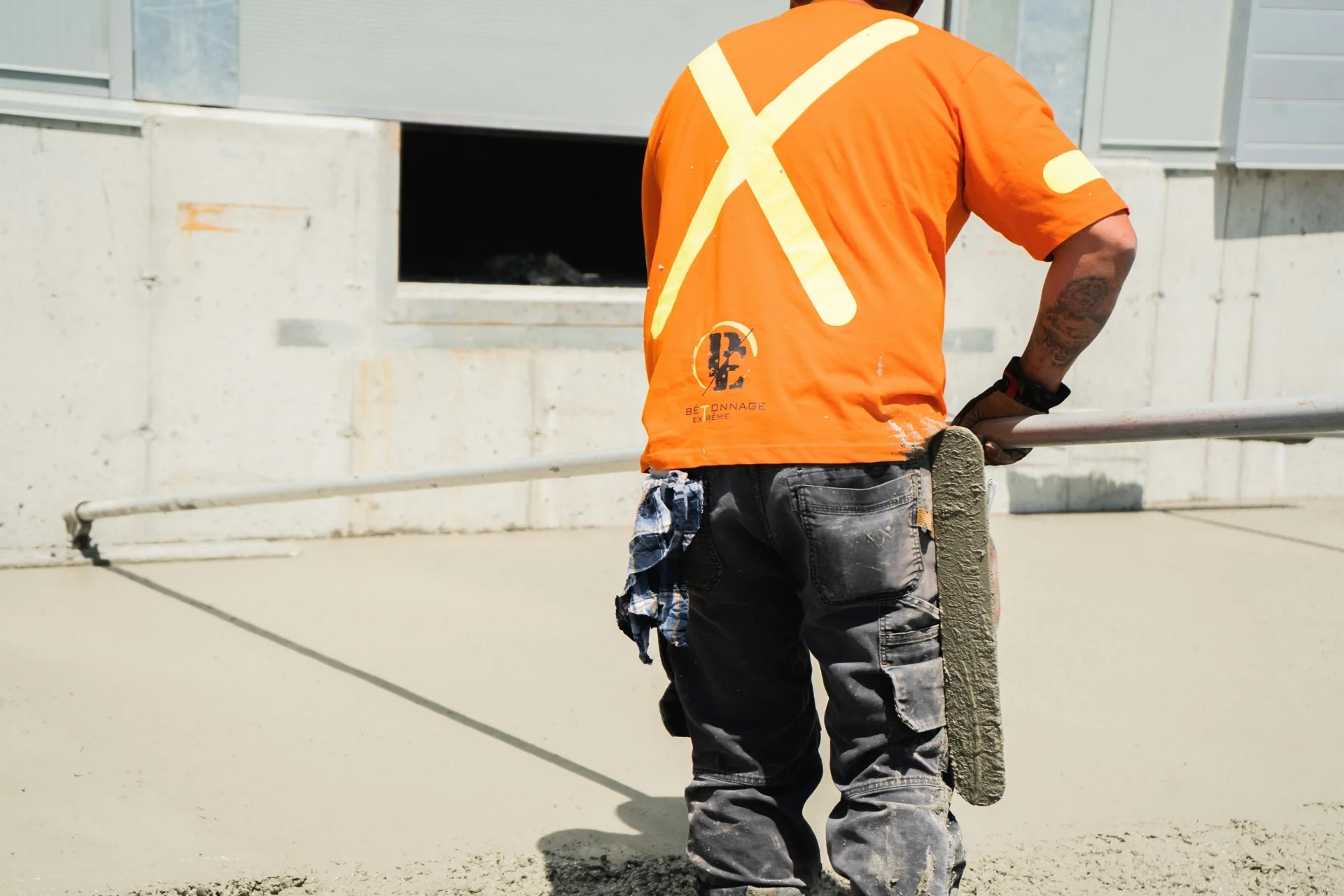 finisher working an Ardex application on a Abbotsford floor