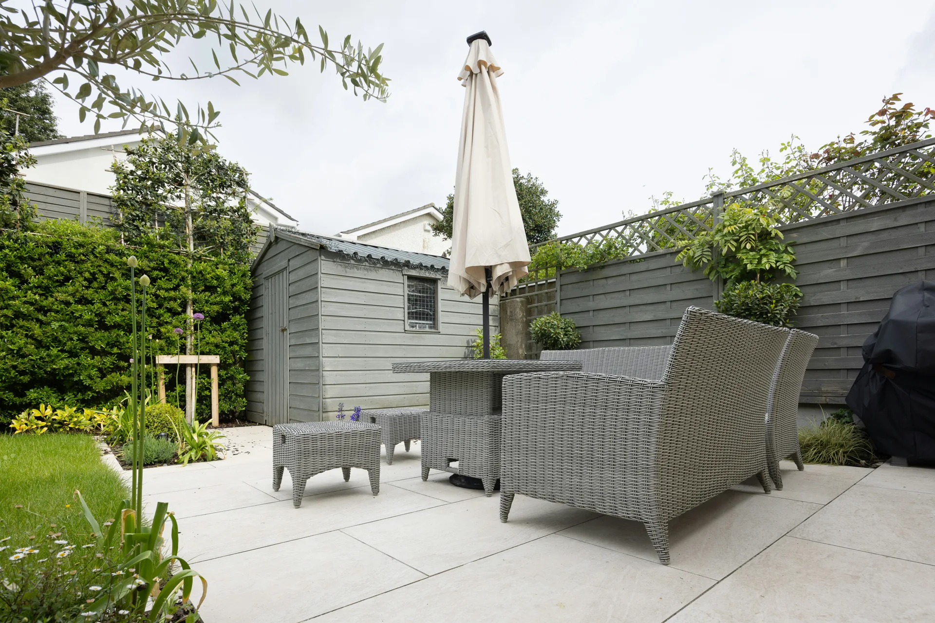 plain concrete patio in a Abbotsford garden setting