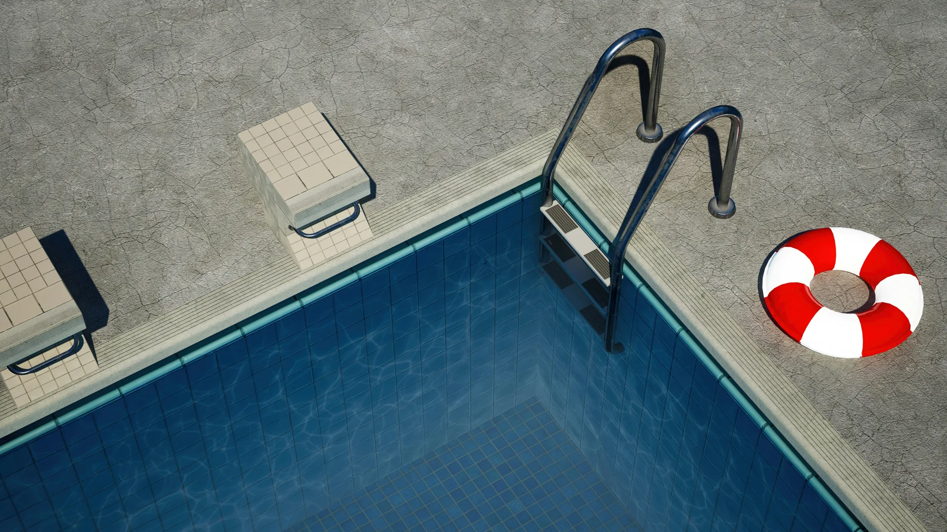 concrete pool deck with starting blocks at a Abbotsford home