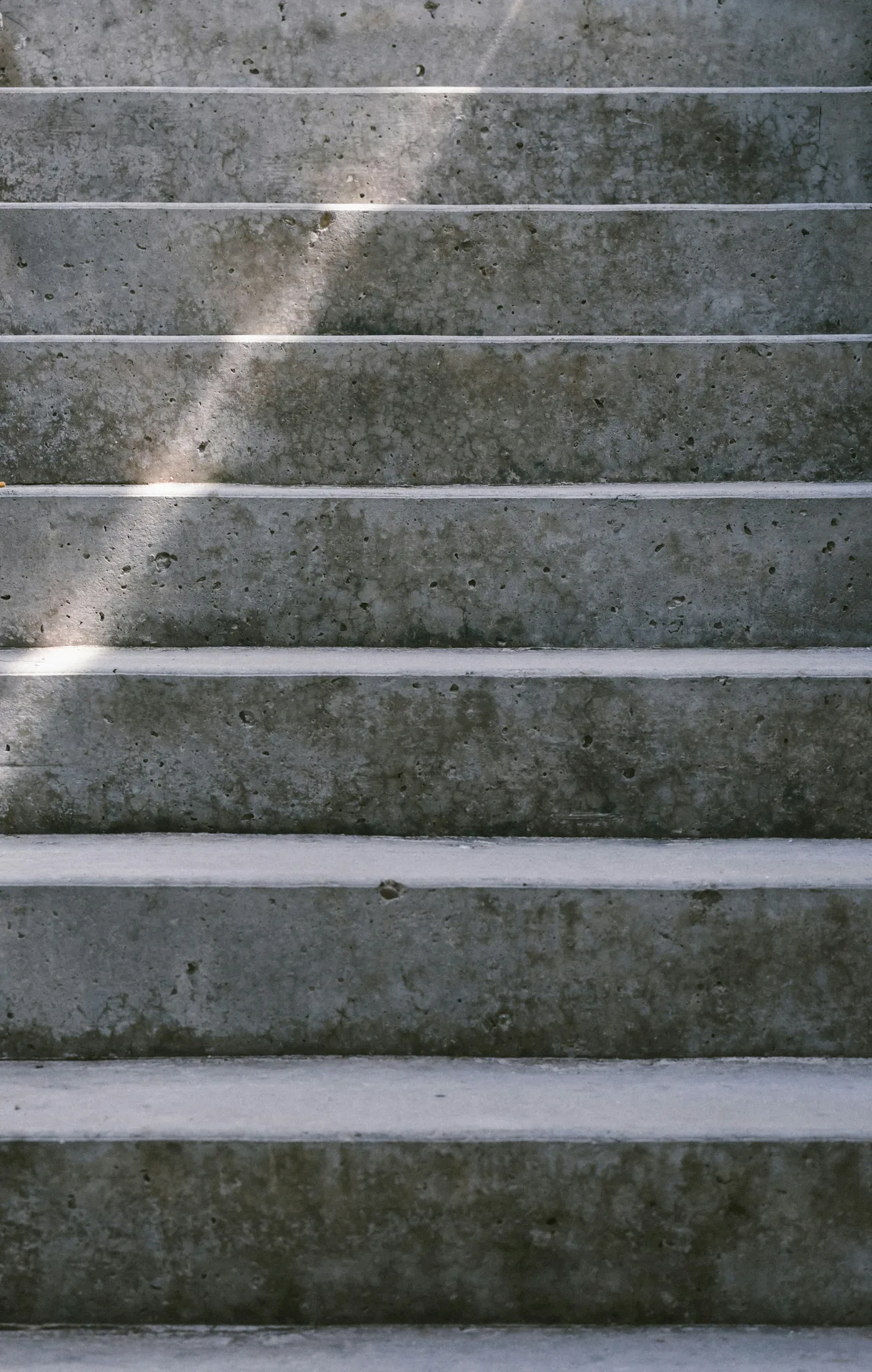 textured concrete entry steps at a Abbotsford home