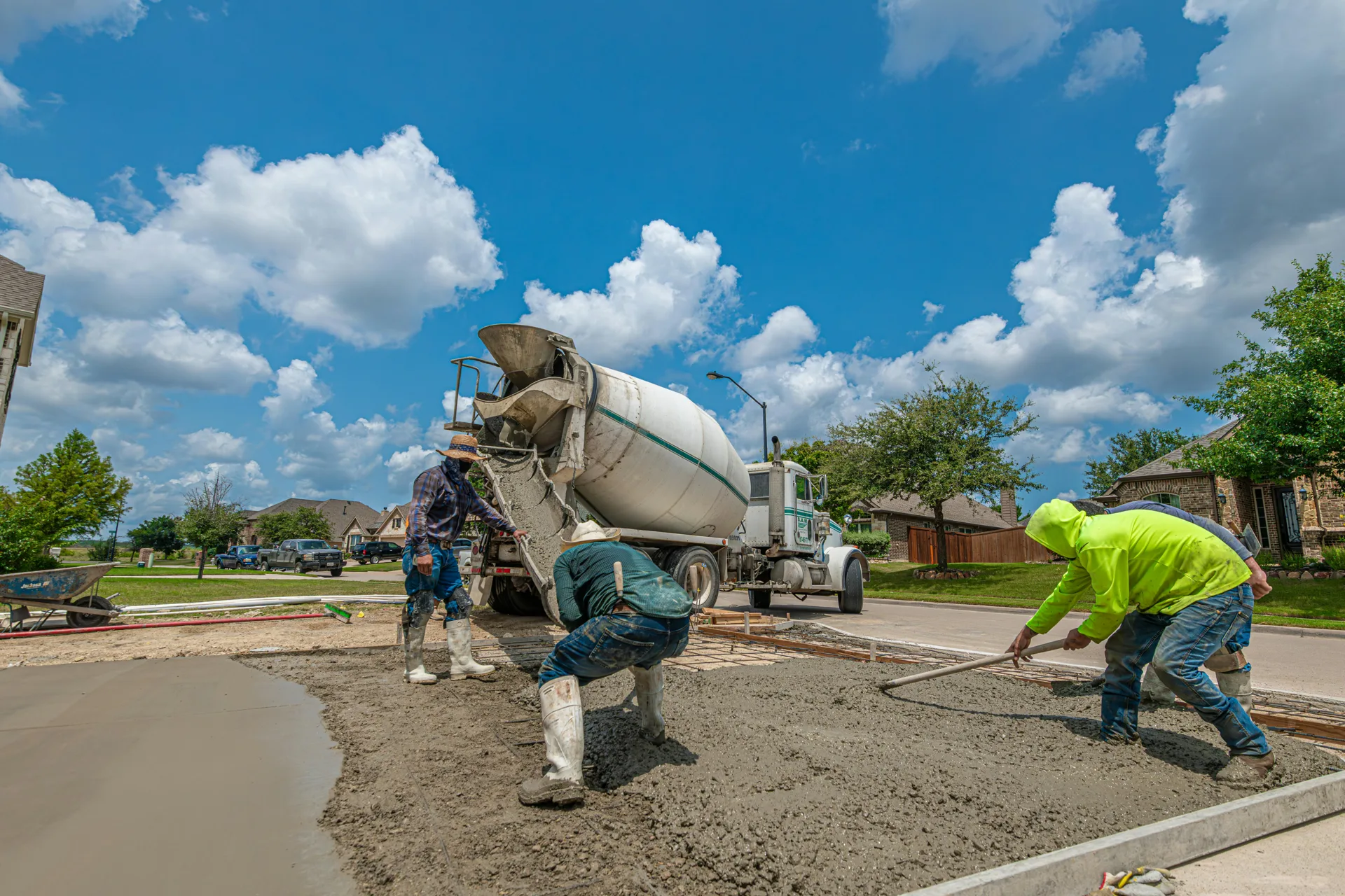 Abbotsford concrete crew finishing a fresh driveway pour