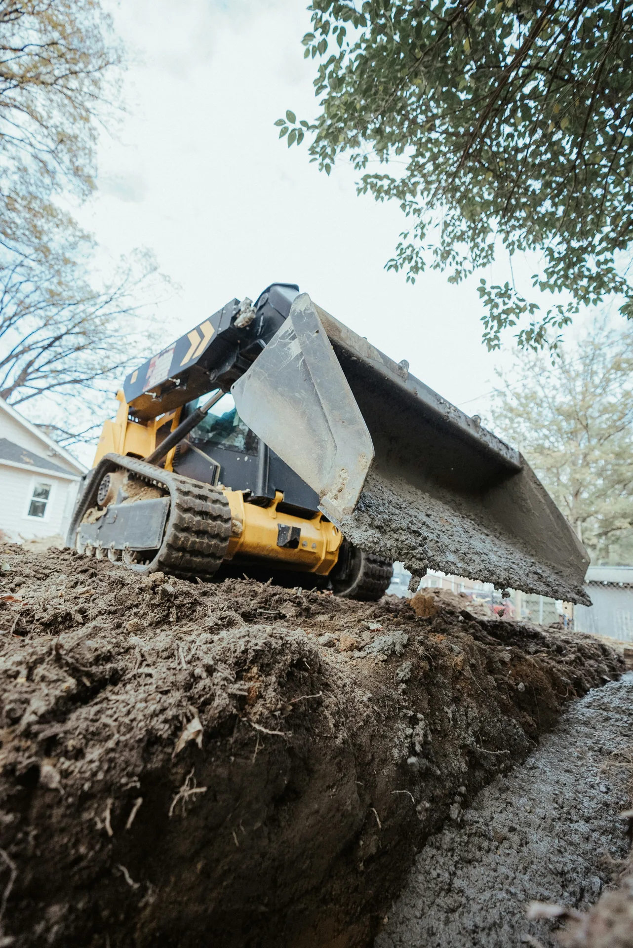 foundation repair pour with a track loader in Abbotsford