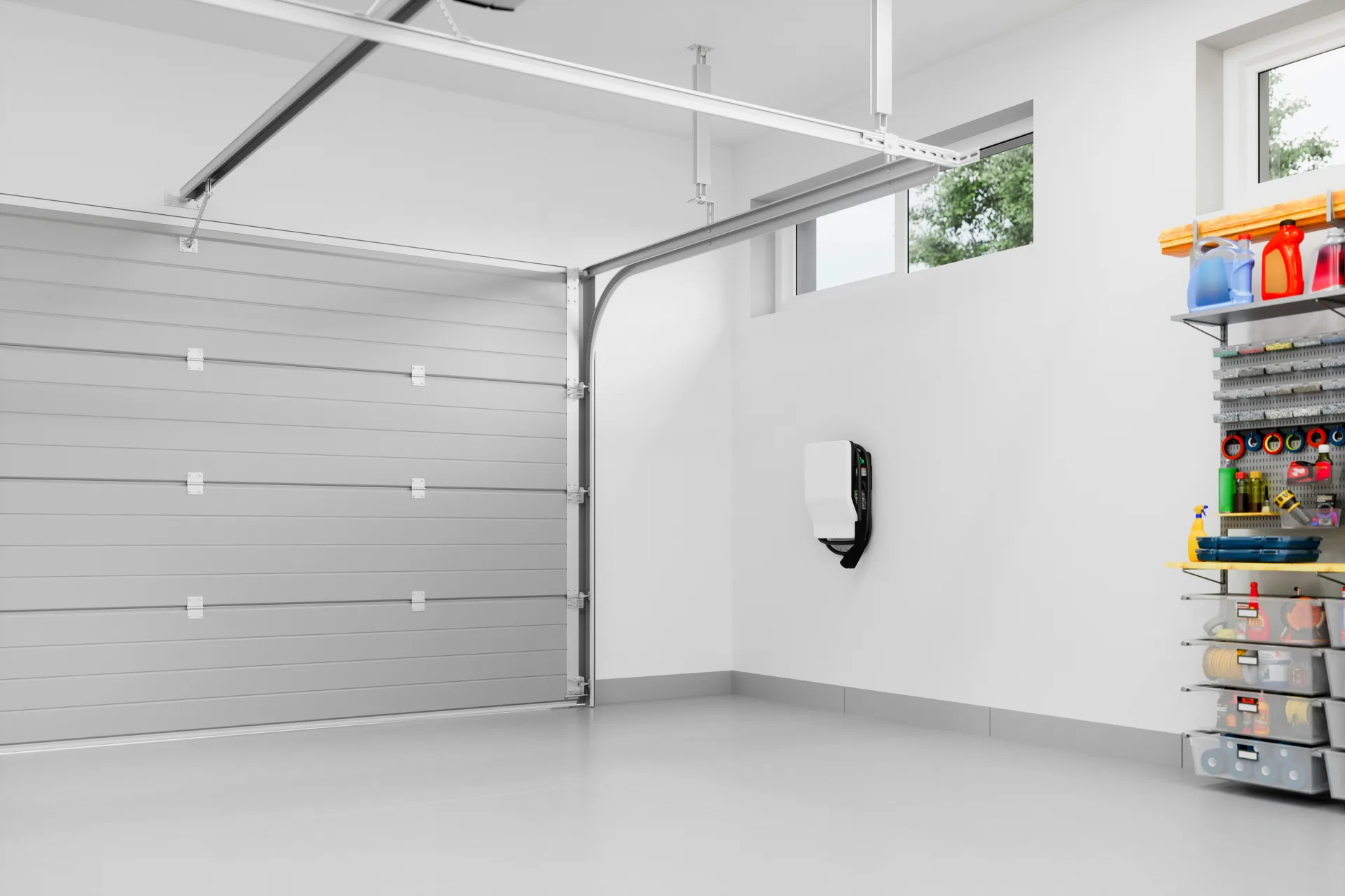 epoxy-coated garage floor with an EV charger at a Abbotsford home