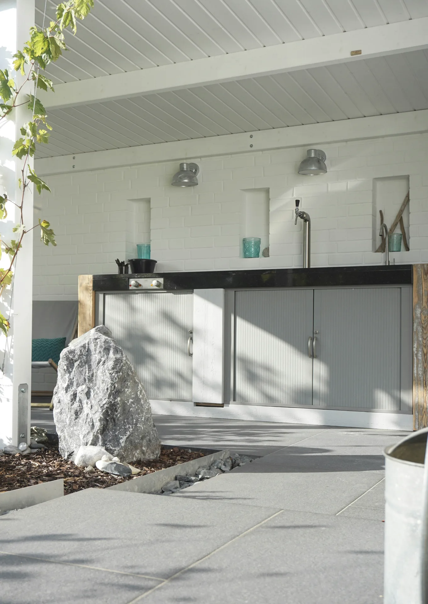polished concrete outdoor bar counter at a Abbotsford home
