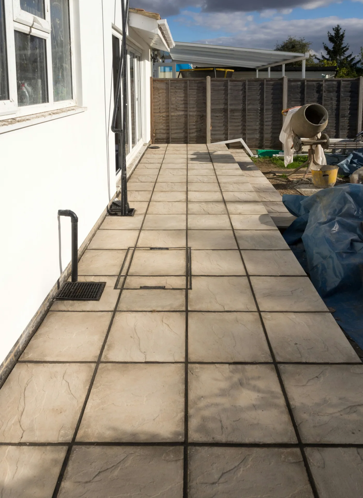 concrete walkway installation along the side yard of a Abbotsford home
